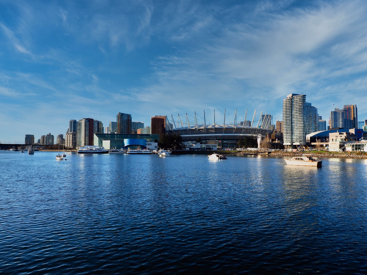 Vancouver skyline across the water with BC Place stadium